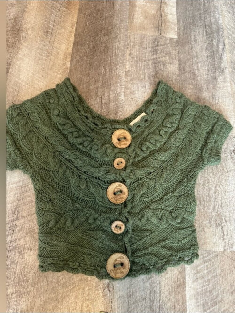 Green crop cable knot sweater, wood button detail